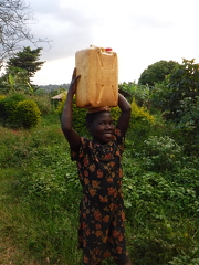 girl with water can